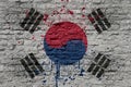 painted big national flag of south korea on a massive old brick wall Royalty Free Stock Photo
