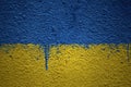 painted big national flag of ukraine on a massive old cracked wall Royalty Free Stock Photo