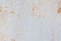 Painted blue metal surface with small spots of rust. Shabby background and texture of a little rusty painted old surface Royalty Free Stock Photo