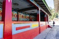 Painted Buddha images in the temple with tourist in Tibetan Buddhism Temple in Sikkim, India Royalty Free Stock Photo