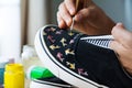 Painted canvas shoes Royalty Free Stock Photo