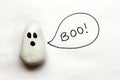 Painted Cartoon Halloween Ghost Rock on White Background with Bo