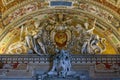 Painted ceilings in corridors and on the wall in the vatican city in rome, italy.