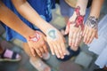 Painted children& x27;s hands in different colors with smilies