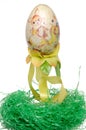 Painted easter egg on a green nest Royalty Free Stock Photo