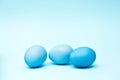 Painted easter eggs on blue background