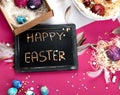 Painted Easter eggs in cardboard box and basket Royalty Free Stock Photo