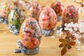 Painted Easter eggs in custom egg holders Royalty Free Stock Photo