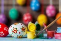 Painted Easter eggs and hanging colorful eggs