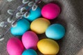 Painted Easter eggs lie on a natural matting along with willow branches. The concept of celebrating Easter Royalty Free Stock Photo