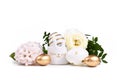 Painted Easter eggs with metallic golden and white stripes and dots and cute easter egg cup in shape of bunny surrounded by spring Royalty Free Stock Photo