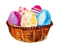 Painted Easter eggs in a wooden basket. Hand drawn watercolor illustration Royalty Free Stock Photo