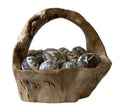 Painted eggs in hand made wood basket isolated