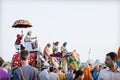 Painted elephants for the Holi Elephant festival riding through the busy traffic with bikes of the city in Jaipur, Rajasthan, Royalty Free Stock Photo