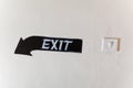 Painted exit sign on wall