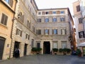 Painted facade with frescoes to Palazzo Ricci to Rome in Italy.