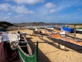 Painted fishermen`s boats on the banks of the Manambolo River in Bekopaka. Madagascar Royalty Free Stock Photo