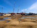 Painted fishermen`s boats on the banks of the Manambolo River in Bekopaka. Madagascar Royalty Free Stock Photo