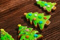 Painted gingerbread Christmas tree on a wooden background