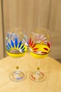 Two hand-painted glasses