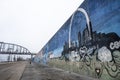 St Louis, Missouri, USA, December 2019 - graffiti spray painted mural of st louis gateway arch on flood wall