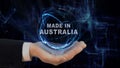 Painted hand shows concept hologram Made in Australia his hand
