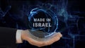 Painted hand shows concept hologram Made in Israel his hand