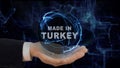 Painted hand shows concept hologram Made in Turkey his hand