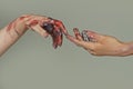 Painted hands. Reach hand. Sensual touch fingers. Two hands trying to touch. Adam sign. Human relation, togetherness