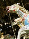 PAINTED HORSES ON VICTORIAN STEAM DRIVEN FAIRGROUND RIDE Royalty Free Stock Photo