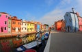 Painted Houses Burano Island near Venice in Italy with blue sky Royalty Free Stock Photo