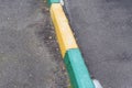 Painted kerbstone on sidewalk Royalty Free Stock Photo