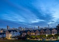 Painted Ladies, cityscape of San Francisco, California, Alamo Square at dawn, the city`s most striking landmark. Royalty Free Stock Photo