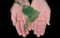 Painted Map Of South America In Our Hands Royalty Free Stock Photo