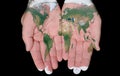 Painted Map Of The World In Our Hands Royalty Free Stock Photo