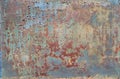 Painted metal with cracks in the paint, roughness, rust. Rusty metal surface. Metal background, texture, backdrop. Royalty Free Stock Photo