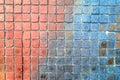 Mosaic brick tile wall, close up of graffiti texture, with vibrant colors. Royalty Free Stock Photo