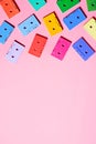 Painted multicolor audio cassettes on pink background, copy space, top view. Retro musical background Royalty Free Stock Photo