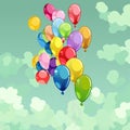 Painted multicolored balloons flying in the sky