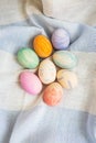 Painted multicolored Easter eggs, eggs painted with watercolors. A cute face in the middle of painted eggs. Easter card Royalty Free Stock Photo