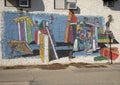 Painted mural with young people, books and Broncho on the side of the student bookstore of the University of Central Oklahoma. Royalty Free Stock Photo