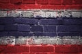 Painted national flag of thailand on a brick wall