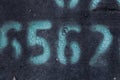 Painted number on blak backdrop