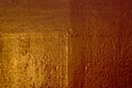 Painted old metal wall. Golden background. Royalty Free Stock Photo