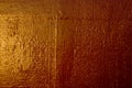 Painted old metal wall. Golden background. Royalty Free Stock Photo