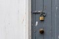 Painted old wooden door bolted shut and locked