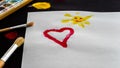 Painted paper with heart shape and sun Royalty Free Stock Photo
