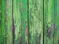 Painted green wood surface, with an abstract expressive vertical line texture. Pastel background for design. Copy paste space