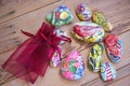 painted pebbles, Stones painted birds and flowers, Decoration. on a wooden table. Royalty Free Stock Photo