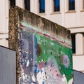 A painted piece of the Berlin Wall on display at Potsdamer Platz in Berlin, Germany Royalty Free Stock Photo